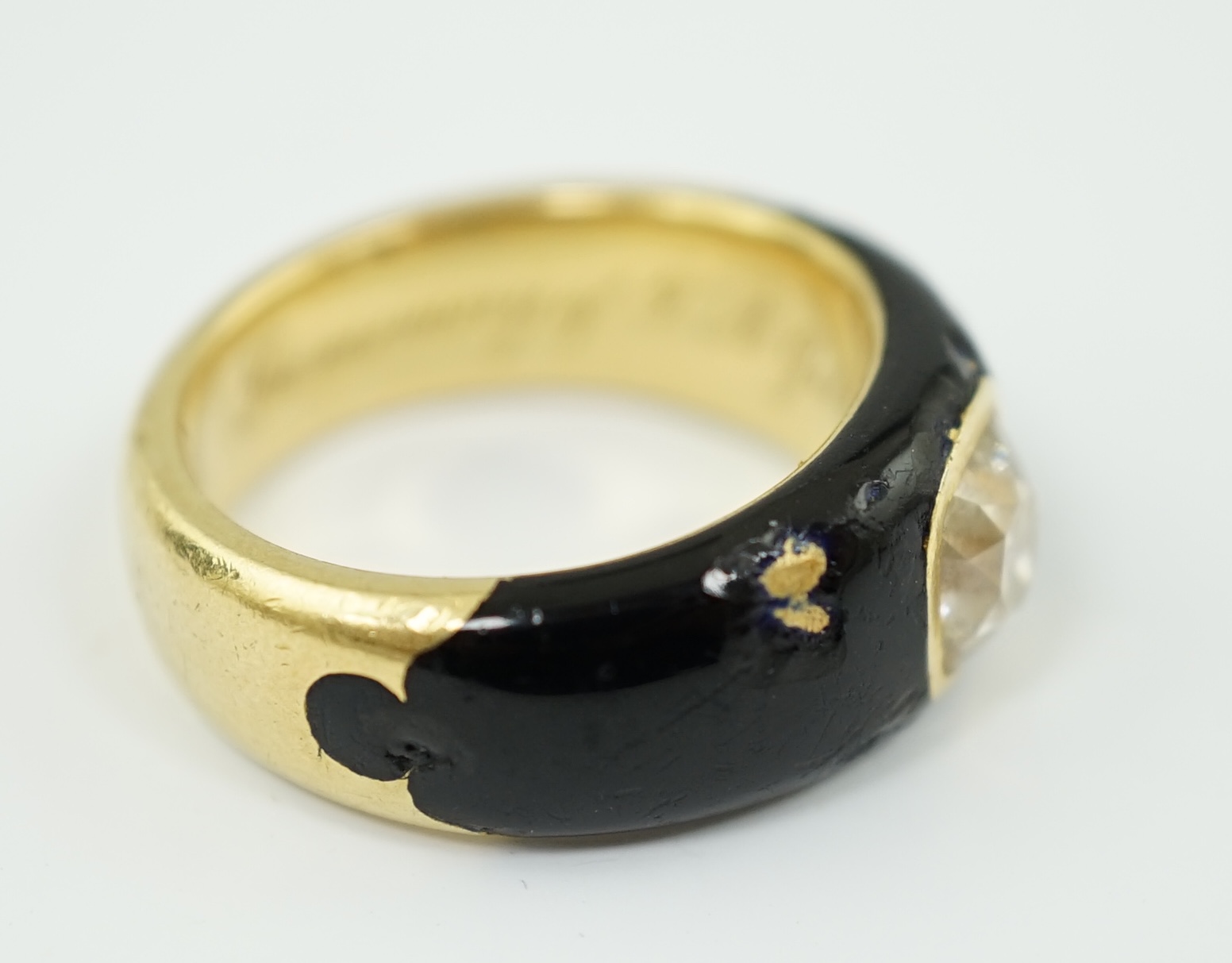 A Victorian gold, black enamel and old mine cut solitaire diamond set mourning ring